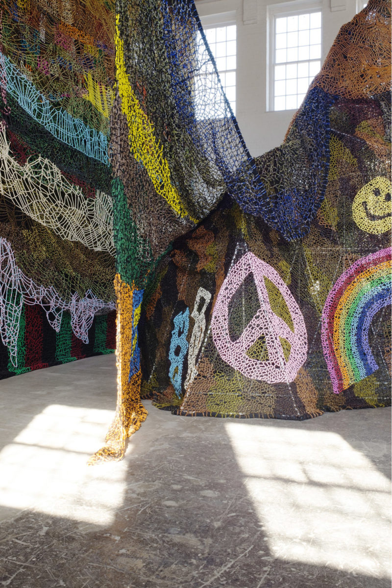 Nick Cave - Beaded Cliff Wall, millions of pony beads threaded onto shoelaces by hand