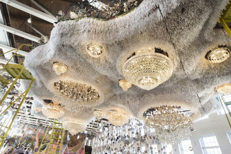 Nick Cave - Crystal Cloudscape, thousands of crystals, beads, found objects and a few chandeliers, 12m long, 6m wide, with four ladders to view artwork from top level, MASS MoCA, 15 Oct 2016 - 4 Sep 2017