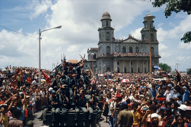 Susan Meiselas - Entering the central plaza in Managua to celebrate victory. Managua, Nicaragua. July 20, 1979