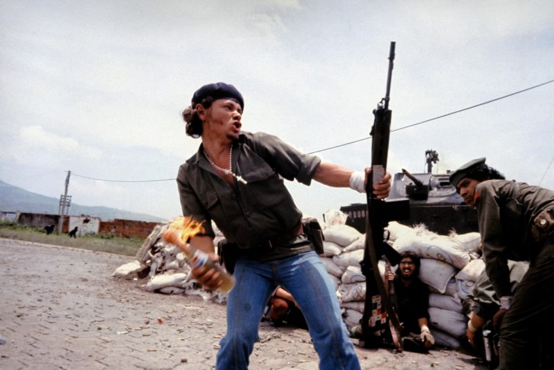 Susan Meiselas - Molotov Man, showing Sandinistas at the walls of the National Guard headquarters, Estelí, Nicaragua, July 16, 1979