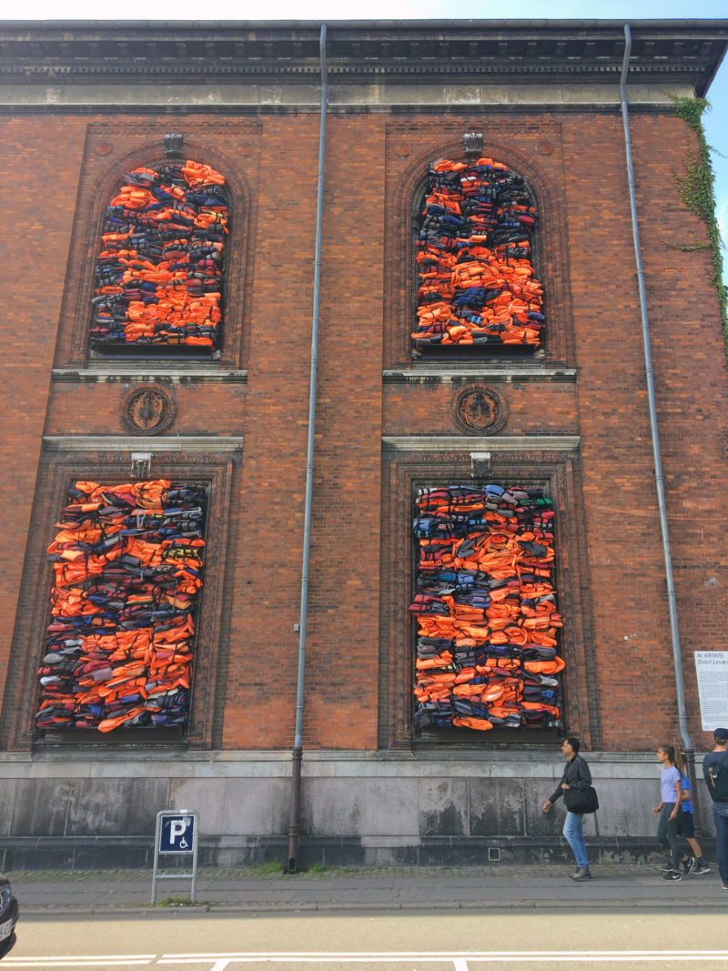 Ai Weiwei – Soleil Levant, 2017, life jackets in front of windows of facade, Kunsthal Charlottenborg, 2017