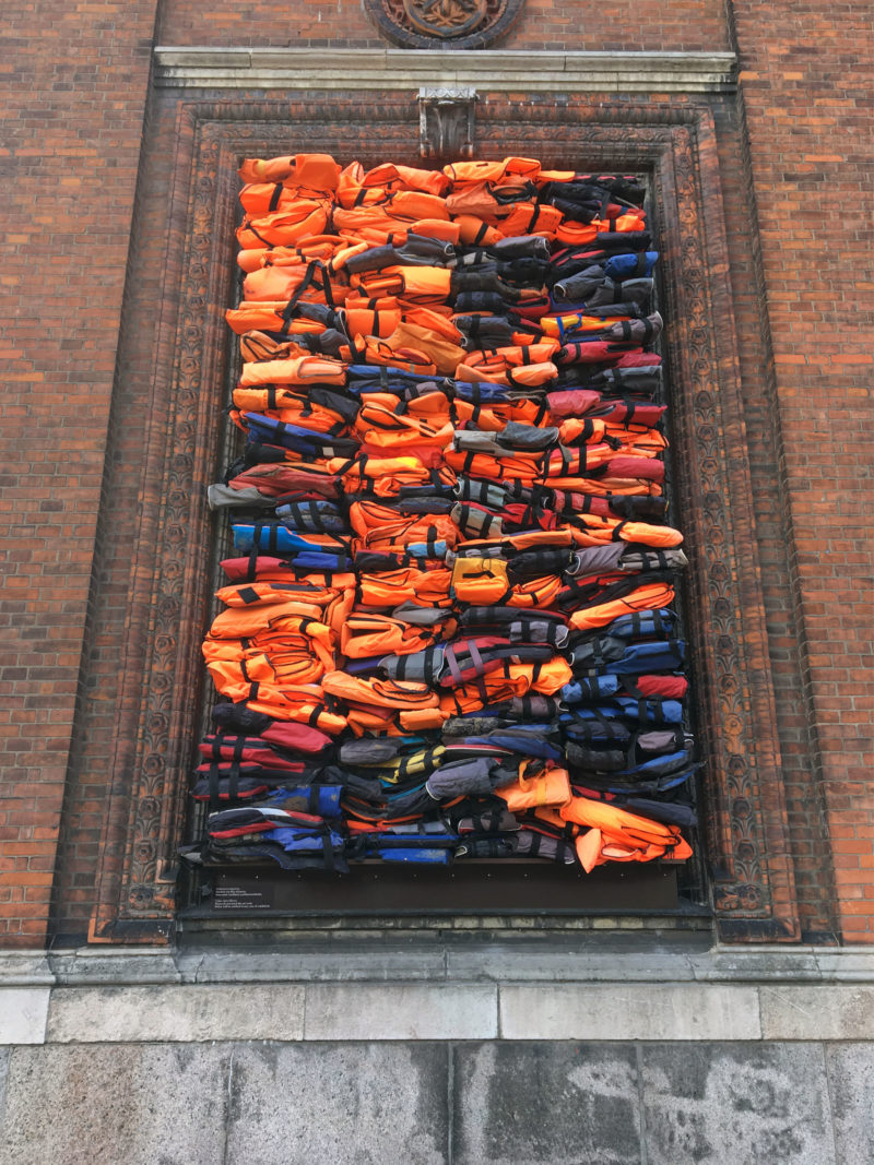 Ai Weiwei – Soleil Levant, 2017, life jackets in front of windows of facade, Kunsthal Charlottenborg, 2017