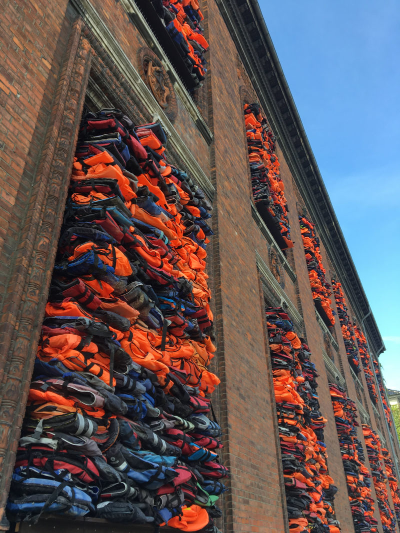 Ai Weiwei – Soleil Levant, 2017, life jackets in front of windows of facade, Kunsthal Charlottenborg, 2017
