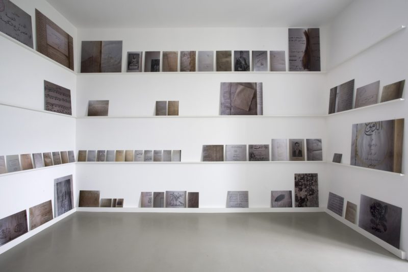Emily Jacir - ex libris, 2010-2012, 178 digital c-prints on Plexiglas (and dibond) dOCUMENTA 13, Kassel, photo Roman März