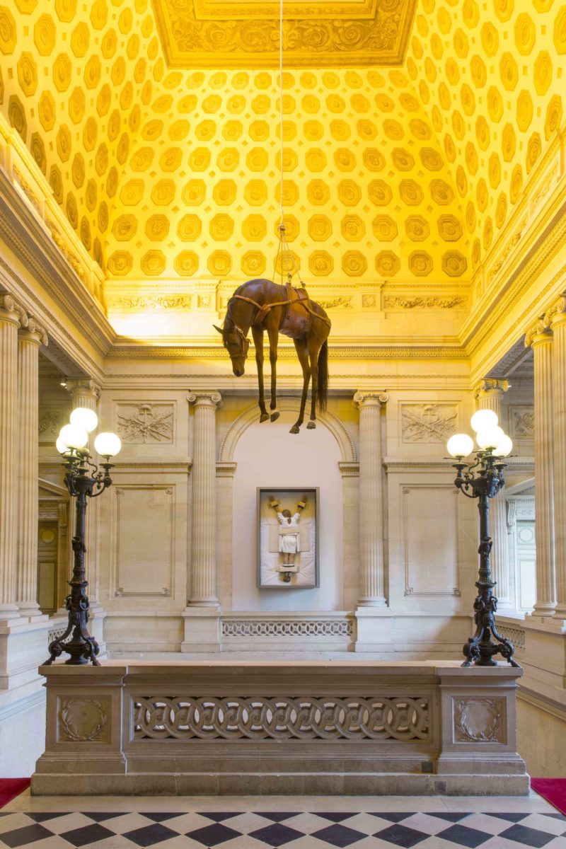 Maurizio Cattelan – Novecento (1900), 1997, taxidermied horse, leather upholstery, rope, pulley, 300 x 170 x 80 cm, installation view, Monnaie de Paris, 2016-2017, photo Zeno Zotti
