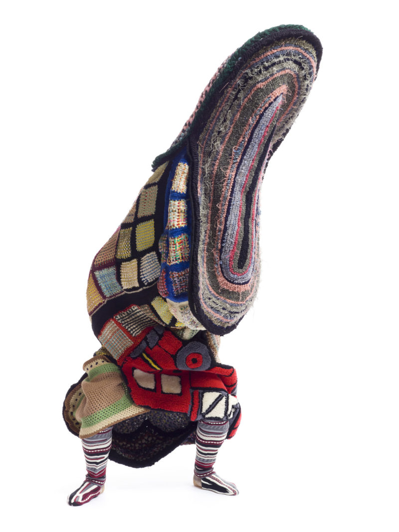 Nick Cave - Soundsuit, 2011, rugs, afghans, metal, fabric, mannequin, 98 1/2 x 21 1/2 x 20 inches