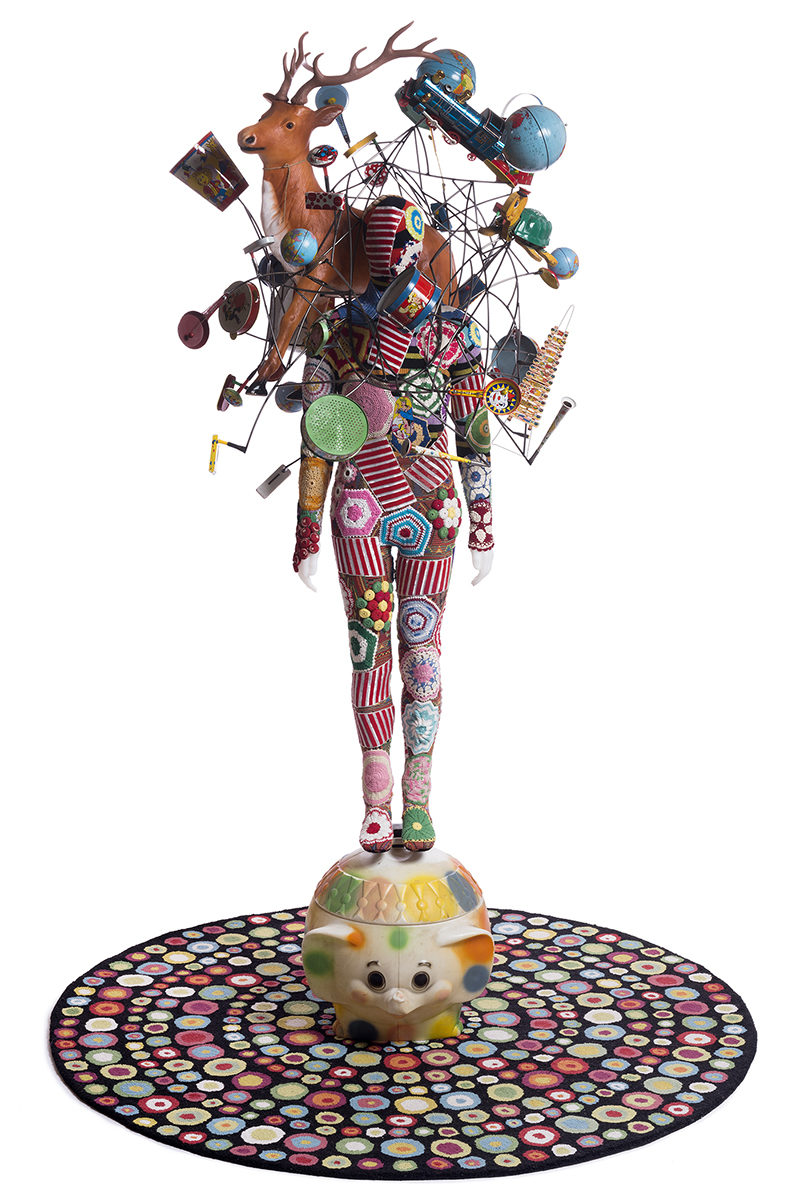 Nick Cave - Soundsuit, 2015, vintage toys, globes, wire, fabric, rug, metal, mannequin, 117 x 50 in