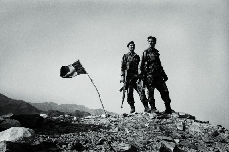 Stephen Dupont - Afghan Army soldiers patrol near the village of Narang with their American allies, Afghanistan, 2005