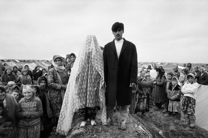 Stephen Dupont - In the 1993 Saki Tajik refugee camp in Afghanistan. A couple of Tajiks are having their picture taken to celebrate their wedding, Mazar-I-Sharif, 1993