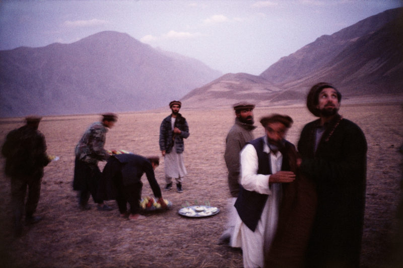 Stephen Dupont – In the Fayzabad Mountains, Afghanistan, in 1998. Commander Massoud, with his friends in the early evening, just after the prayer.