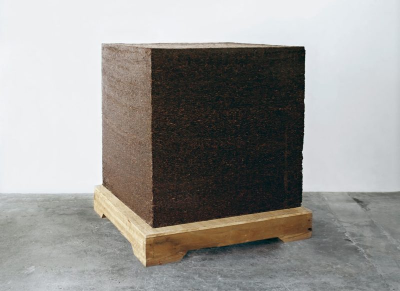 Ai Weiwei - Ton of Tea, 2005, Pu'er tea leaves from Yunnan province with wooden base, 100 x 100 x 100 cm (39 1/2 x 39 1/2 x 39 1/2 in)