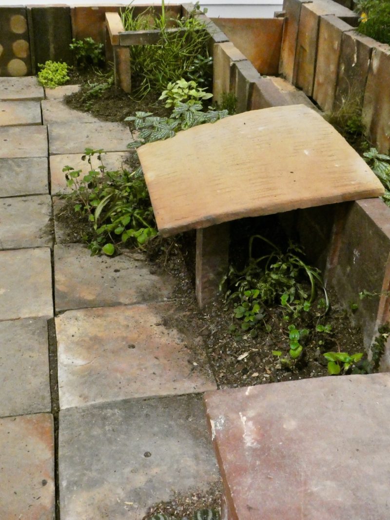 Huang Yongping - Abbottabad, 2013, ceramic, soil, and plants, installation view, Hirshhorn Museum and Sculpture Garden, 2018