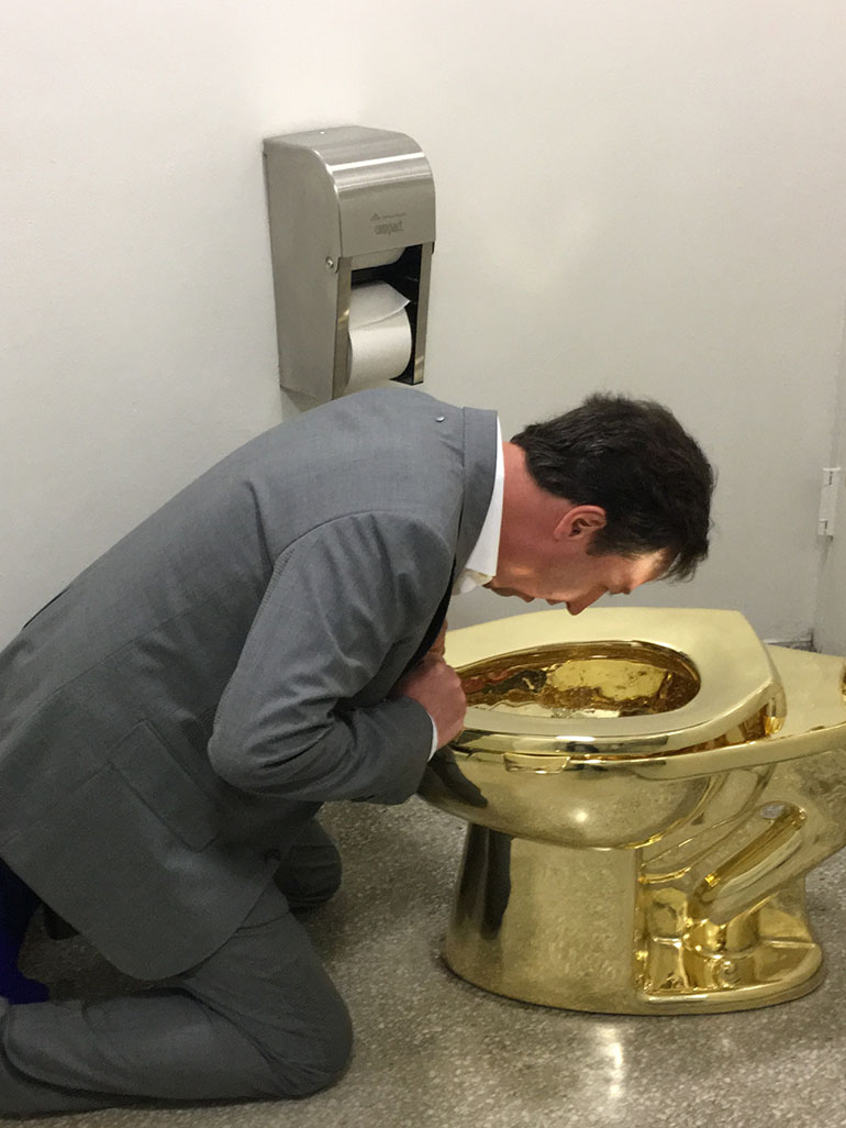 Maurizio Cattelan's America - A real golden toilet