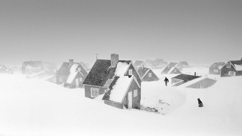 Ragnar Axelsson - Last Days of the Arctic - Blizzard in Ittoqqortoormiit village on the east coast of Greenland