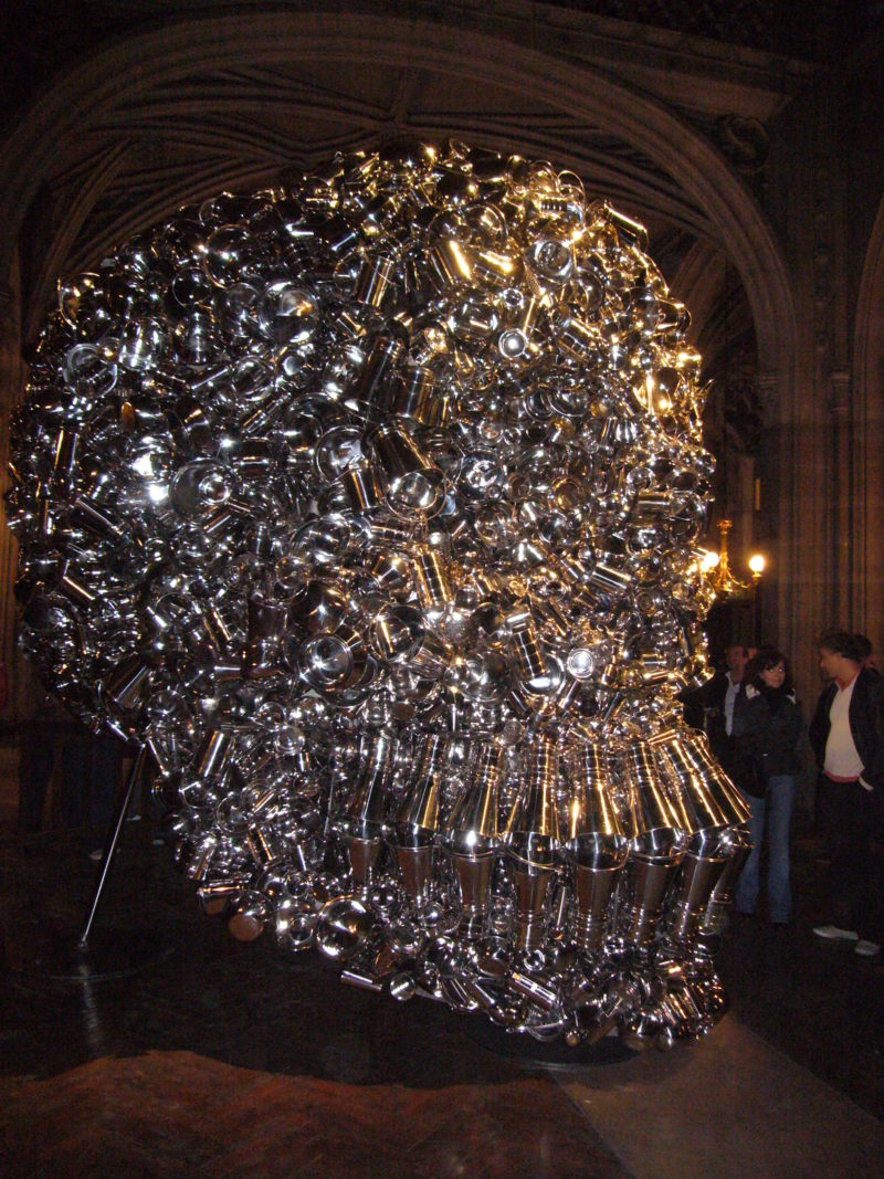 Subodh Gupta – Very Hungry God, 2006, hundreds of stainless steel containers, 360 x 280 x 330 cm, installation view, Nuit blanche, Église St Bernard, Paris, 2006