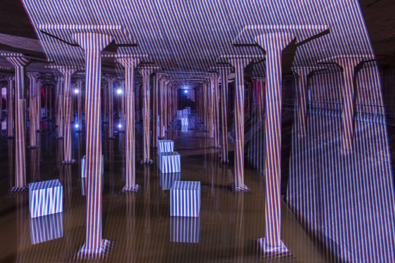 Carlos Cruz-Diez - Spatial Chromointerference, 2018, 26 projectors, 30 cubes, installation view, Buffalo Bayou Park Cistern, 2018-2019