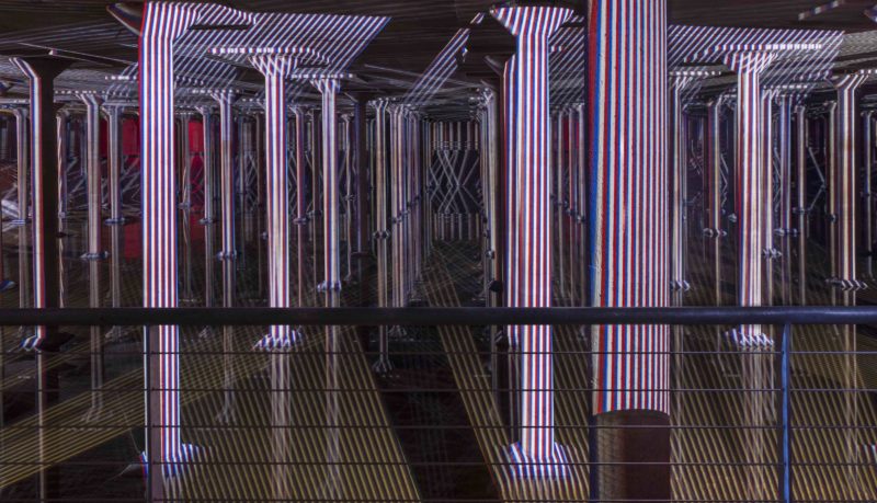 Carlos Cruz-Diez - Spatial Chromointerference, 2018, 26 projectors, 30 cubes, installation view, Buffalo Bayou Park Cistern, 2018-2019