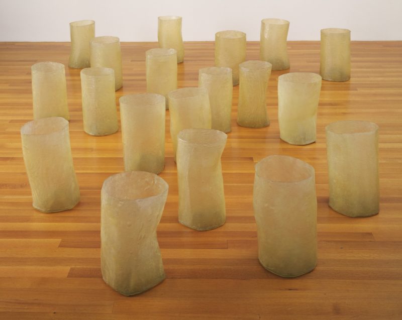 Eva Hesse - Repetition Nineteen III, 1968, Fiberglass and polyester resin, nineteen units, Each 19 to 20 1/4 (48 to 51 cm) x 11 to 12 3/4 (27.8 to 32.2 cm) in diameter