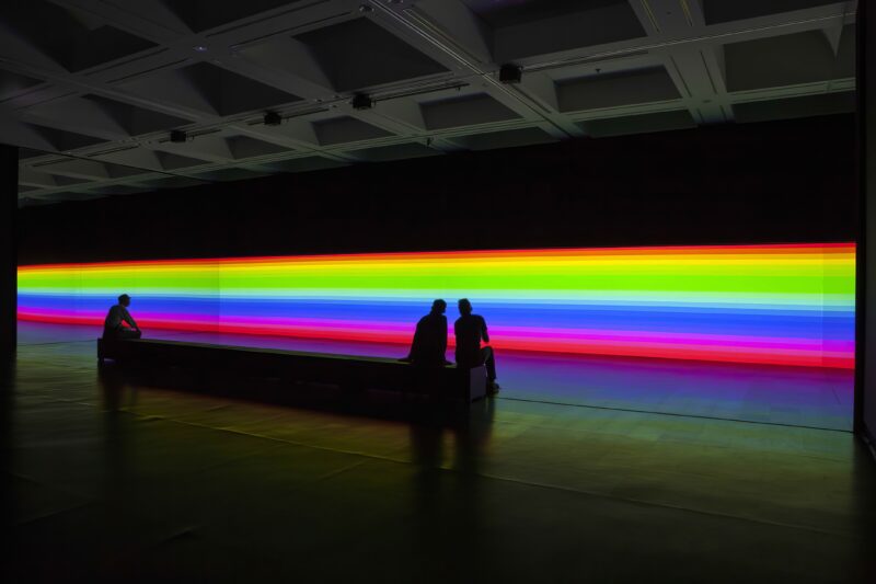 Carsten Nicolai – unicolor, 2014, DLP-projectors, DMX-LED lights, projection screen, mirrors, computer, sound, bench with loudspeakers