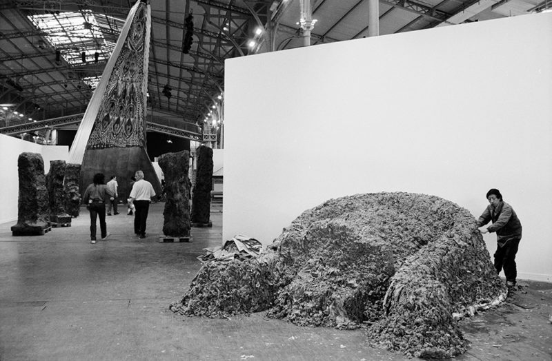 Huang Yong Ping - Reptiles, 1989, installation, paper mache, washing machines 7 x 4 x 3m. installation view, The Magicians of the Earth, Grande Halle de la Villette, Paris, France, 1989
