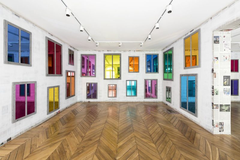 Ugo Rondinone - Clockwork for Oracles II, 2008, 52 mirrors, color plastic gel, wood, paint dimensions variable, installation view, Phillips, Paris