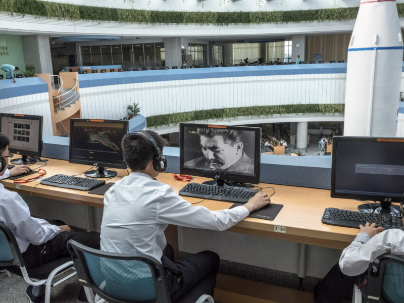 Carl De Keyzer - A student watches a video about Joseph Stalin at the Science and Technology Center, Pyongyang. 26 May 2017 3.00 PM