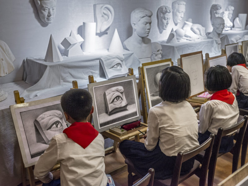 Carl De Keyzer - Drawing class at the recently renovated Manggyondae Schoolchildren’s Palace. Pyongyang. 1 June 2017 4.00 PM