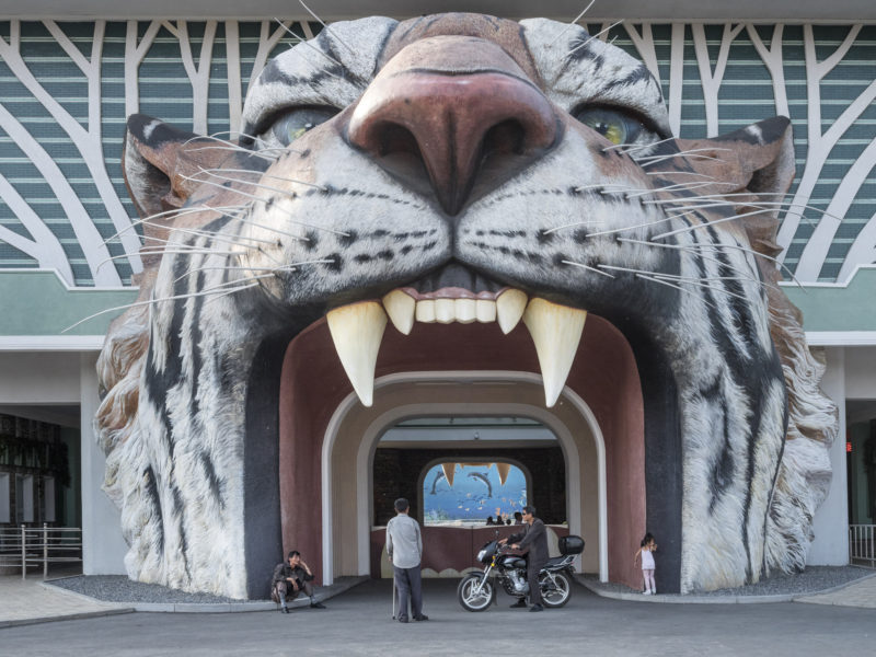 Carl De Keyzer - Into the tiger’s mouth; entrance to the Pyongyang Zoo. 28 May 2017 5.00 PM