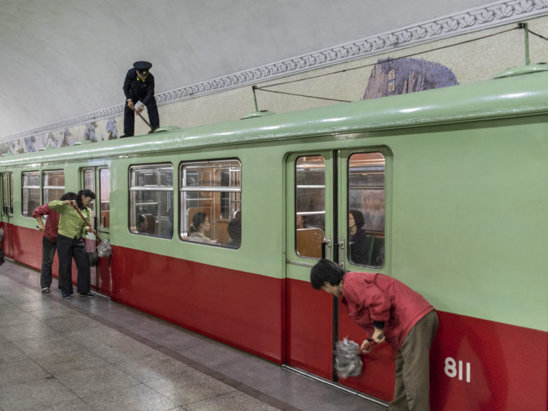 Carl De Keyzer - Metro staff wipe down a car, Pyongyang. The metro is closed for two days a month for fullscale maintenance. 9 October 2015 4:00 PM