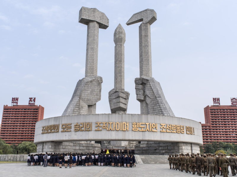 Carl De Keyzer - Monument to Party Foundation. Pyongyang. The symbol of the Korean Workers’ Party adds a writing brush, for the intelligentsia, to the traditional hammer and sickle of other communist parties. 8 October 2015 2:00 PM