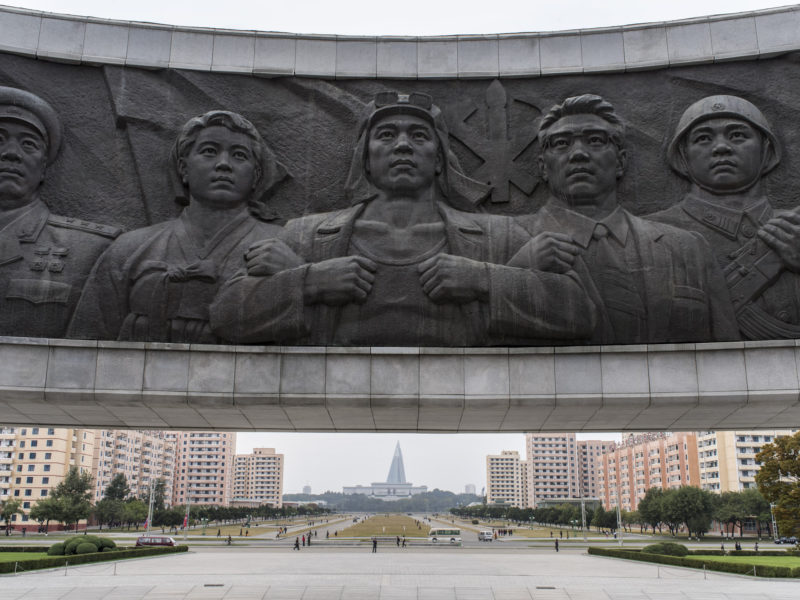 Carl De Keyzer - Monument to Party Foundation. Pyongyang. Bronze relief depicting workers, farmers, and intellectuals, flanked by the soldiers. The symbol of the Korean Workers’ Party adds a writing brush, signifying the intelligentsia, to the traditional hammer and sickle of other communist parties. 8 October 2015 1:00 PM