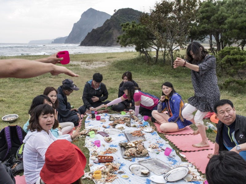 Carl De Keyzer - Mt. Chilbo, North Hamgyong Province. Ethnic Koreans from China enjoy a beachside picnic of fresh seafood. Many of China’s roughly two million citizens of Korean descent have family ties just across the border. Large populations of ethnic Koreans also live abroad in Japan and the United States. 19 September 2015 5:00 PM