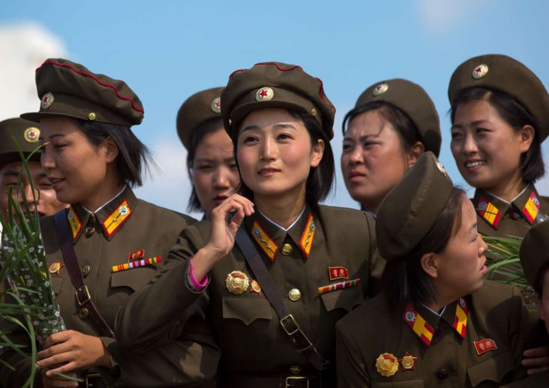 Eric Lafforgue – North Korea - Smiling North Korean female soldiers in Tower of the Juche Idea, Pyongyang​