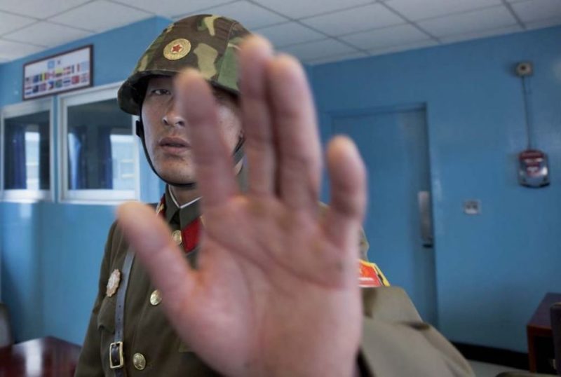 Eric Lafforgue – North Korea - Taking pictures in the DMZ is easy, but if you come too close to the soldiers, they stop you