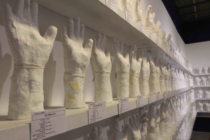 Htein Lin - A Show of Hands, 2013–present, surgical plaster, dimensions variable, installation view