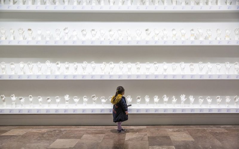 Htein Lin - A Show of Hands, 2013–present, surgical plaster, dimensions variable, installation view, Albright-Knox Art Gallery, February 16–April 28, 2019