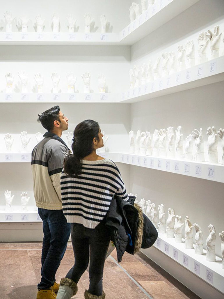Htein Lin – A Show of Hands, 2013–present, surgical plaster, dimensions variable, installation view, Albright-Knox Art Gallery, February 16–April 28, 2019 feat
