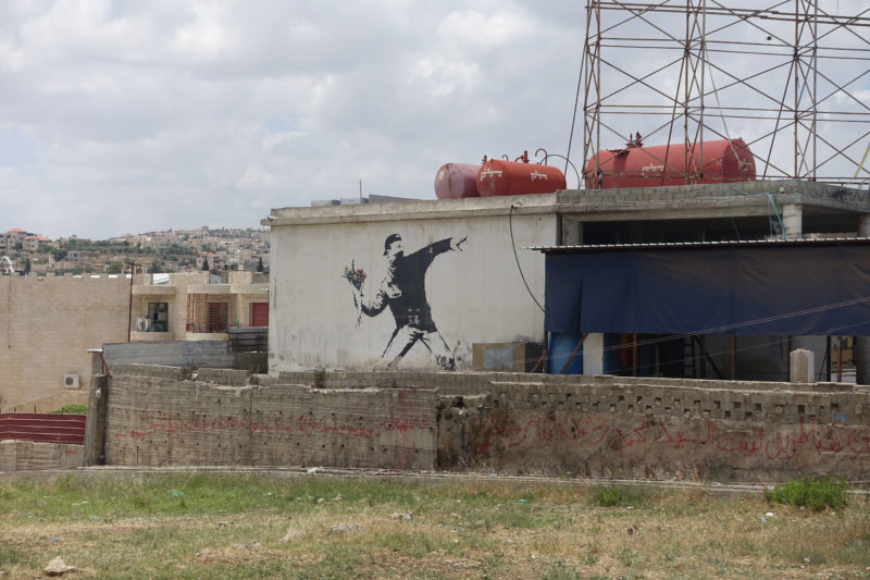 Banksy - Love Is In The Air, Flower Thrower, 2005, Ash Salon Street, Bethlehem, West Bank