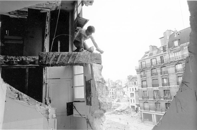 Gordon Matta-Clark cutting Conical Intersect in Paris, 1975