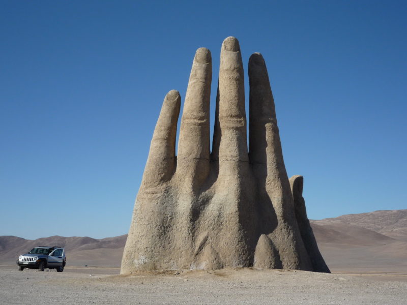 Mario Irarrázabal – Mano del Desierto (Hand of the Desert), 1992, concrete, iron frame, 11 metres (36 ft) tall, installation view,  Atacama Desert, Chile