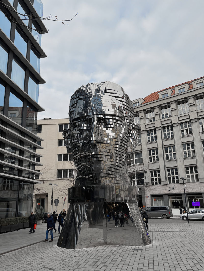 David Černý - Head of Franz Kafka, 2014, 40 layers of polished stainless steel, motors, electronics, 10.6 meters tall, 39 tonnes, installation view, Prague, Czech Republic