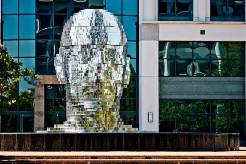 David Černý - Metalmorphosis, 2007, 40 layers of polished stainless steel, motors, electronics, 7 meters tall, 13 tonnes, installation view, Whitehall Corporate Center in Charlotte, North Carolina, USA