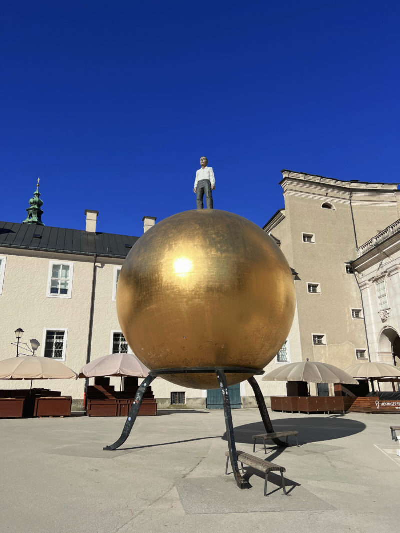 Stephan Balkenhol - Sphaera, 2007, steel, plastic, bronze and gold leaf, 8,8-meter height, 5-meter diameter, 3,5 tonnes, installation view, Kapitelplatz, Salzburg, Austria