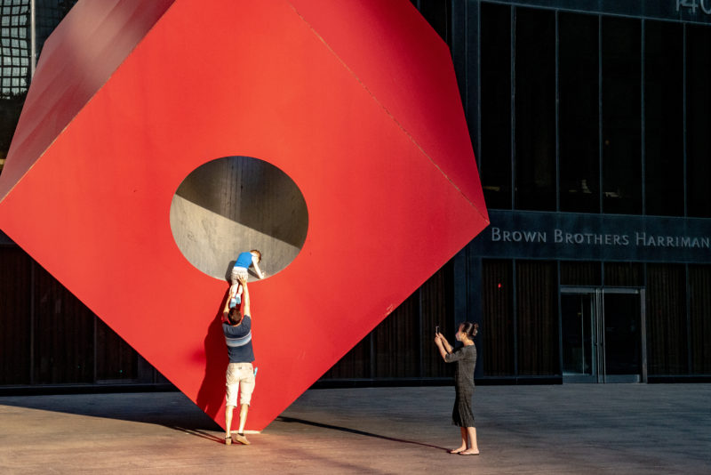 Isamu Noguchi - Red Cube, 1968, steel, aluminum, 24 feet tall, installation view, 140 Broadway, New York