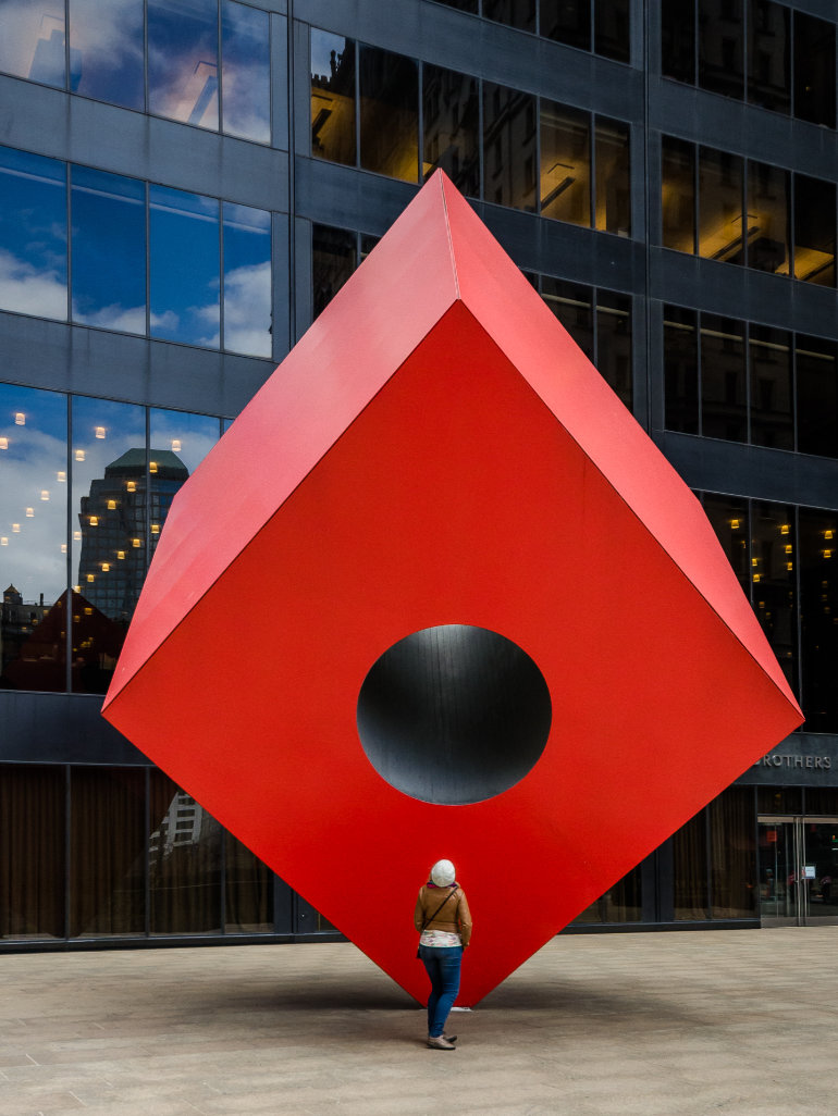 Isamu Noguchi - Red Cube, 1968, steel, aluminum, 24 feet tall, installation view, 140 Broadway, New York feat