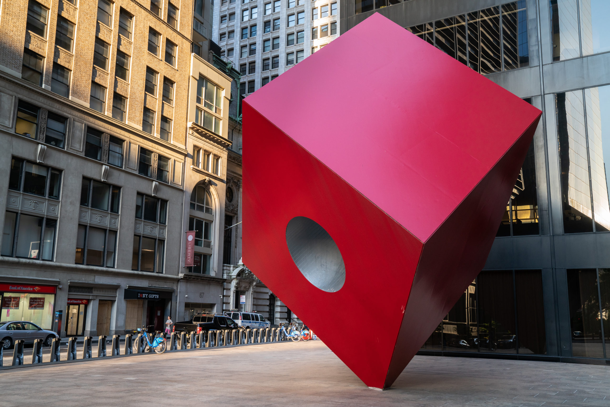 https://publicdelivery.org/wp-content/uploads/2022/07/Isamu-Noguchi-Red-Cube-1968-steel-aluminum-24-feet-tall-installation-view-140-Broadway-New-York-scaled.jpg