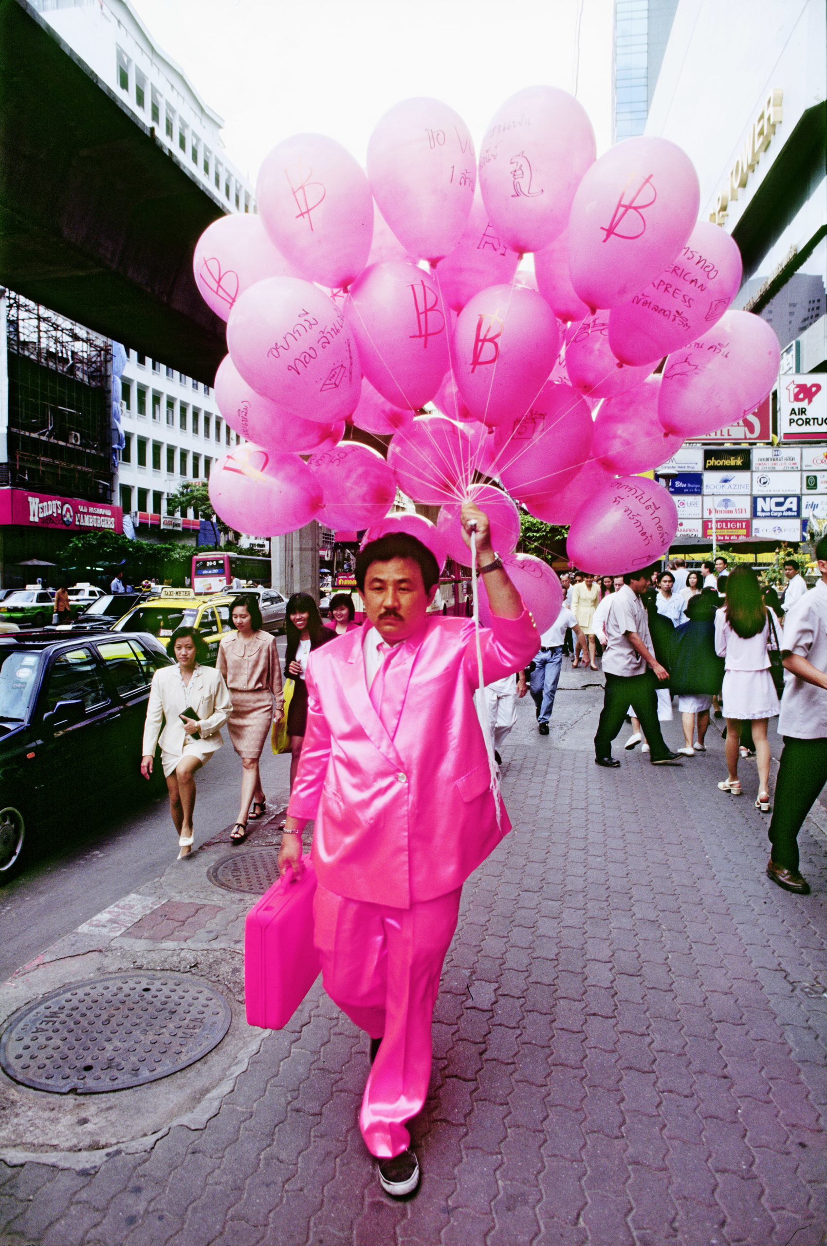 Manit Srivanichpoom - Pink Man, 1997 – On-going, performance by Sompong Thawee
