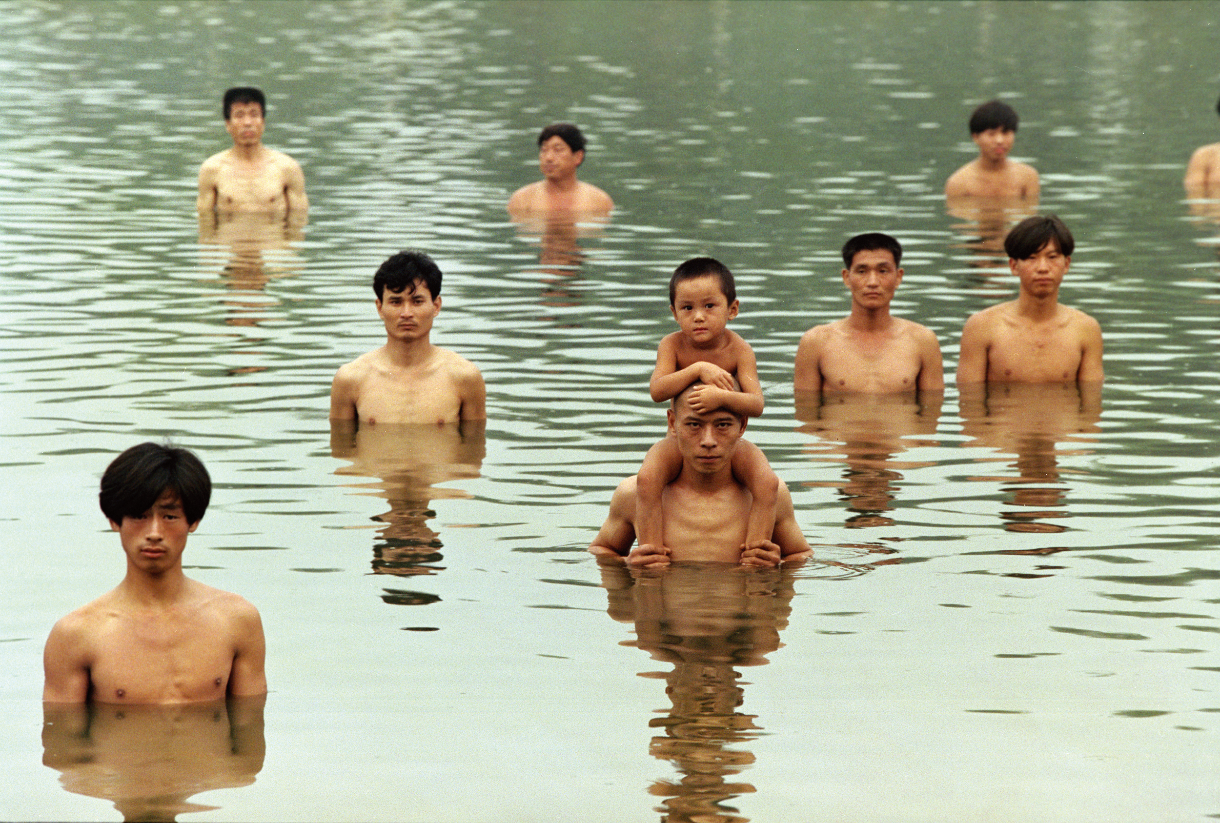 Zhang Huan – To Raise the Water Level in a Fishpond, 1997, 6 min 9 sec, Beijing, China