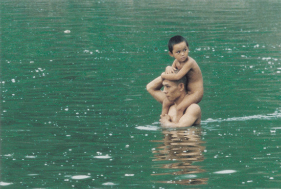 Zhang Huan – To Raise the Water Level in a Fishpond, 1997, video still, 6 min 9 sec, Beijing, China