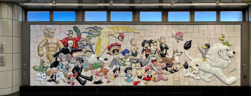 Tezuka Osamu - Characters on Parade, 2019, 460 ceramic tiles, 2.6 meters high, 8.8 meters wide, installation view, Kokusai-Tenjijō station, Kōtō, Tokyo, Japan